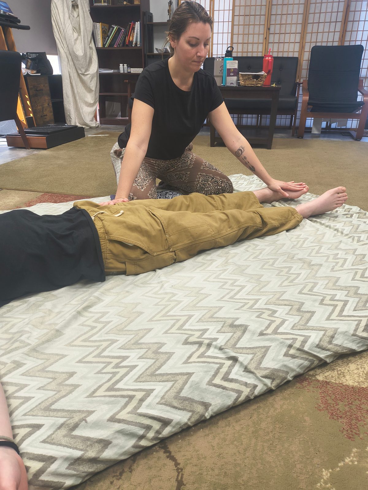 Hip opening technique with two practitioners