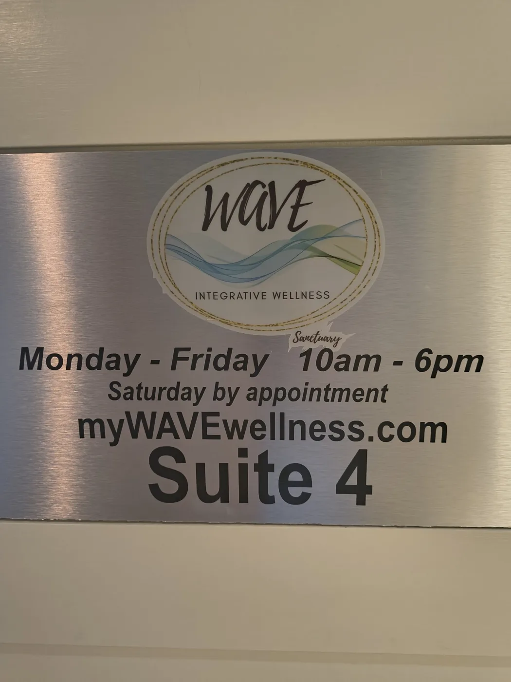 Suite 4 door sign for WAVE Integrative Wellness Sanctuary, 8520 S Tamiami Trail Sarasota